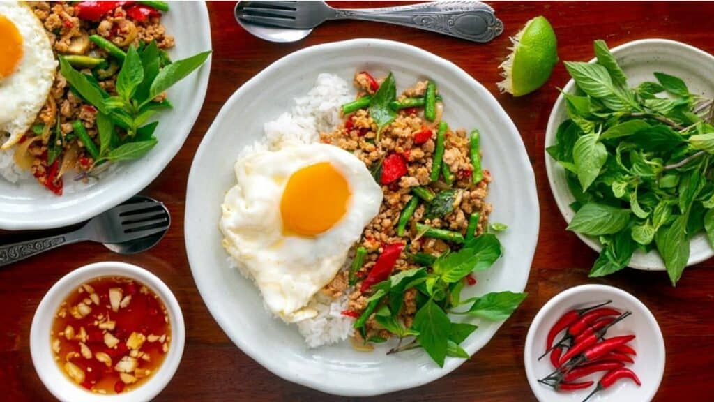 image of Pad Krapow, which is rice with pork and served with an egg