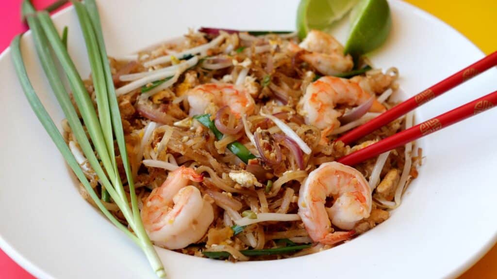 image of a plate with Pad Thai Goong, which is one of the most commonly sold Thai Street foods, served with shrimp
