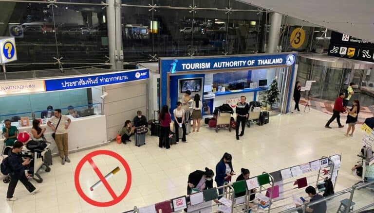 bangkok airport with a sign of prohibited to smoke